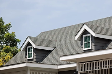 Custom Remodelers Inc. installing metal roofing on a Twin Cities home